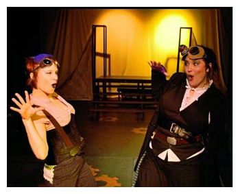 BFF Patti Neff-Tiven and Bridget Farias high-fiving (photo: John Carroll, Weird City Theatre Company)