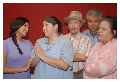 Diana Martinez as Lupita, with Victoria Alvarez & the cast (photo: Teatro Vivo)